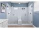 Large walk-in shower with bench seat at 1407 Fairview Cir, Reunion, FL 34747