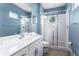 Well-appointed bathroom with shower and modern vanity at 1407 Fairview Cir, Reunion, FL 34747