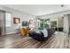 Spacious living room with sliding doors to pool at 1407 Fairview Cir, Reunion, FL 34747