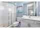 Bathroom with shower, toilet, and vanity at 1407 Fairview Cir, Reunion, FL 34747
