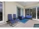 Relaxing patio with lounge chairs and sectional sofa at 1407 Fairview Cir, Reunion, FL 34747