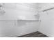 Spacious walk-in closet with wire shelving and ample hanging space at 1407 Fairview Cir, Reunion, FL 34747