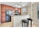 Modern kitchen with granite countertops and black appliances at 909 Charo Pkwy # 1021, Davenport, FL 33897