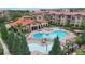 Aerial view of resort-style pool, spa, and ' area at 909 Charo Pkwy # 1021, Davenport, FL 33897