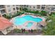 Relaxing pool and spa area with plenty of surrounding green space at 909 Charo Pkwy # 1021, Davenport, FL 33897