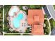 Overhead view of community pool and clubhouse at 909 Charo Pkwy # 1021, Davenport, FL 33897