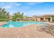 Enjoy this community pool with a spa and comfortable lounge chairs at 909 Charo Pkwy # 1021, Davenport, FL 33897
