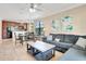 Open concept living space with kitchen and dining area at 909 Charo Pkwy # 1021, Davenport, FL 33897