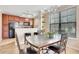 Kitchen dining area with a table and chairs near a large window at 909 Charo Pkwy # 1021, Davenport, FL 33897