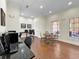Bright and spacious community room with computers and a work area at 909 Charo Pkwy # 1021, Davenport, FL 33897