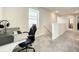 Upstairs office space with a workspace and plenty of natural light at 13041 Inkwell Aly, Winter Garden, FL 34787