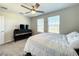 Bedroom with ceiling fan and ample closet space at 13041 Inkwell Aly, Winter Garden, FL 34787