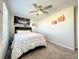 Bright bedroom with ceiling fan and decorative wall art at 13041 Inkwell Aly, Winter Garden, FL 34787