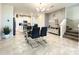 Bright kitchen and dining area with an island and modern finishes at 13041 Inkwell Aly, Winter Garden, FL 34787