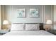 King-size bed with grey bedding and nightstands at 3151 Paradox Cir # 101, Kissimmee, FL 34746