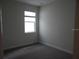 Bedroom with neutral walls and carpet flooring at 3025 Ballad Rd, Kissimmee, FL 34746