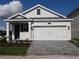 Charming one-story home with two-car garage at 3025 Ballad Rd, Kissimmee, FL 34746