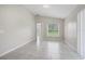 Open living room with tile floors and natural light at 839 Jarnac Dr, Kissimmee, FL 34759