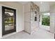 Modern front door with glass panels at 634 Burch Ave, Winter Garden, FL 34787