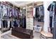 Large walk-in closet with ample shelving and hanging space at 25822 Feather Ridge Ln, Sorrento, FL 32776
