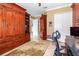 Spacious home office with built-in cabinetry and ample workspace at 25822 Feather Ridge Ln, Sorrento, FL 32776