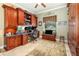 Bright home office with built-in cabinetry and ample workspace at 25822 Feather Ridge Ln, Sorrento, FL 32776
