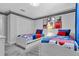 Mickey Mouse themed bedroom with twin beds at 740 Pebble Beach Dr, Davenport, FL 33896