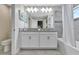 Bathroom with double vanity, and bathtub at 740 Pebble Beach Dr, Davenport, FL 33896