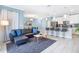 Spacious living room with comfortable seating and an open layout at 740 Pebble Beach Dr, Davenport, FL 33896