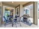 Patio with grill and outdoor dining area at 740 Pebble Beach Dr, Davenport, FL 33896