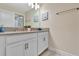 Bathroom with double vanity and tile flooring at 740 Pebble Beach Dr, Davenport, FL 33896