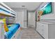 Bedroom with bunk beds and dresser at 740 Pebble Beach Dr, Davenport, FL 33896