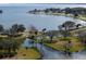 Aerial view of waterfront park and residential area at 12965 Trovita Dr, Grand Island, FL 32735