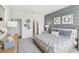 Spacious bedroom with stylish decor and en-suite bathroom access at 12965 Trovita Dr, Grand Island, FL 32735