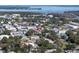 Aerial view of a town's cityscape and residential areas at 12965 Trovita Dr, Grand Island, FL 32735