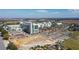 Aerial view of a modern hospital campus with parking at 12965 Trovita Dr, Grand Island, FL 32735