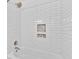 Clean bathroom featuring white subway tile and a new bathtub at 2811 Vine St, Orlando, FL 32806