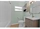 Updated bathroom with white subway tile and a modern vanity at 2811 Vine St, Orlando, FL 32806