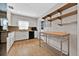 Clean kitchen with white cabinets, granite countertops, and stainless steel appliances at 2811 Vine St, Orlando, FL 32806