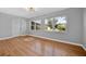 Bright living room with wood floors and large windows at 2811 Vine St, Orlando, FL 32806