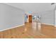 Bright living room with hardwood floors and a modern wood accent wall at 2811 Vine St, Orlando, FL 32806