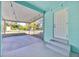 Covered patio with string lights and backyard access at 2811 Vine St, Orlando, FL 32806