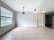 Bright dining area with window, tile floor and exterior view at 200 Saint Andrews Blvd # 1402, Winter Park, FL 32792