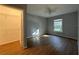 Bedroom with large closet and wood-look floors at 6584 Swissco Dr # 714, Orlando, FL 32822