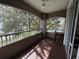 Screened balcony overlooking a peaceful lake view at 3384 Corona Village Way # 108, Orlando, FL 32835