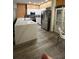 Modern kitchen with stainless steel appliances and island at 3384 Corona Village Way # 108, Orlando, FL 32835