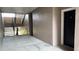 Building interior hallway with stairs and unit entrance at 3384 Corona Village Way # 108, Orlando, FL 32835