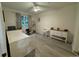 Spacious bedroom with wood-look floors and ample closet space at 3384 Corona Village Way # 108, Orlando, FL 32835