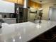 Modern kitchen with stainless steel appliances and island at 3384 Corona Village Way # 108, Orlando, FL 32835