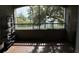 Lake view from a screened balcony, ideal for relaxing at 3384 Corona Village Way # 108, Orlando, FL 32835